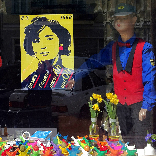 East German poster in antique shop window