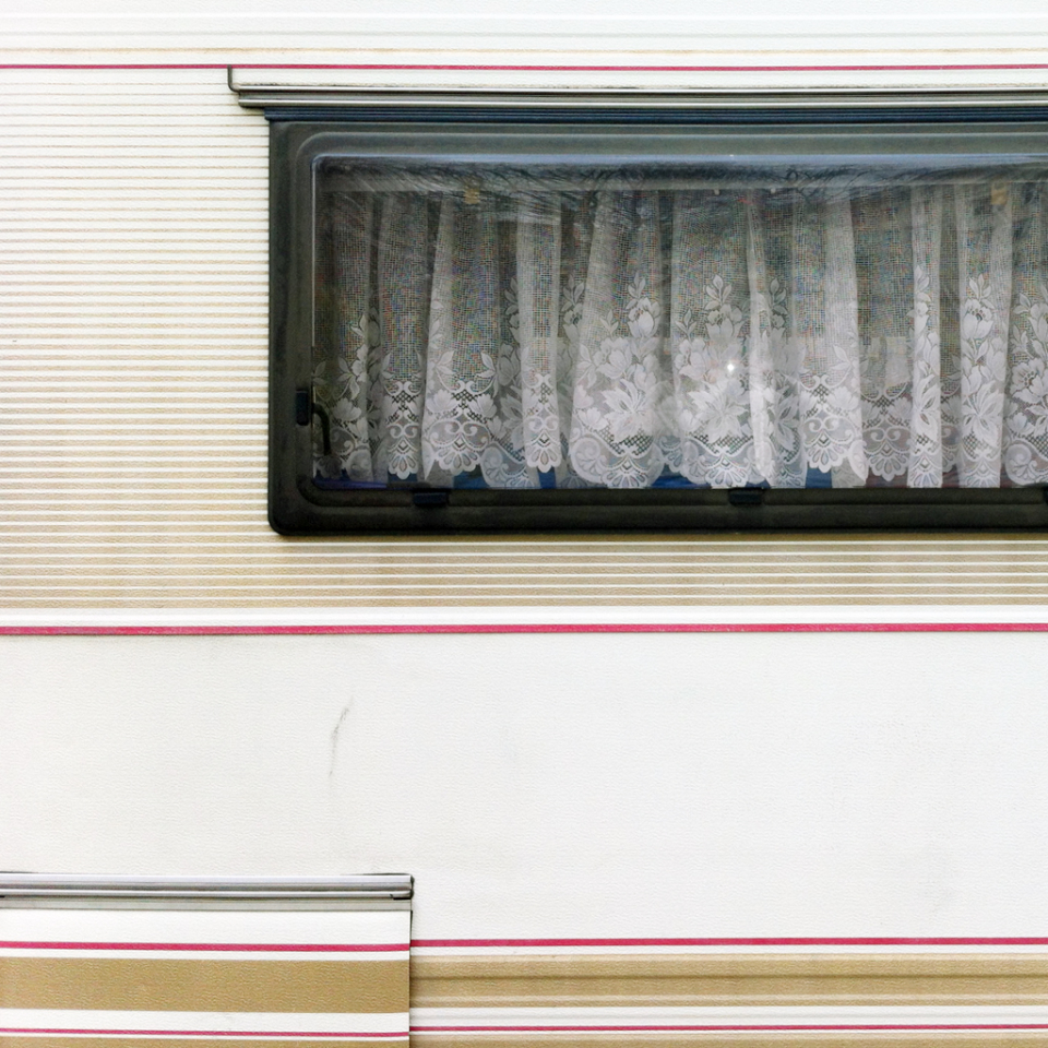 striped mobile home with window