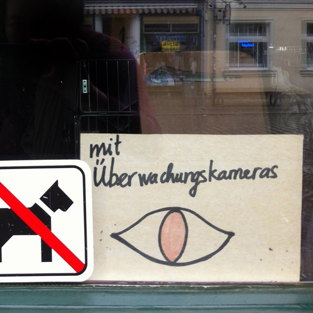 Hand-drawn sign in shop window