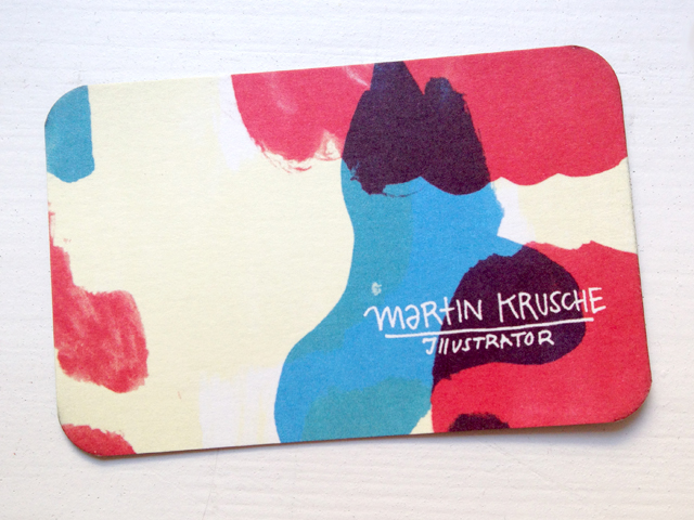 Business card with colorful paint splashes and "Martin Krusche Illustrator"