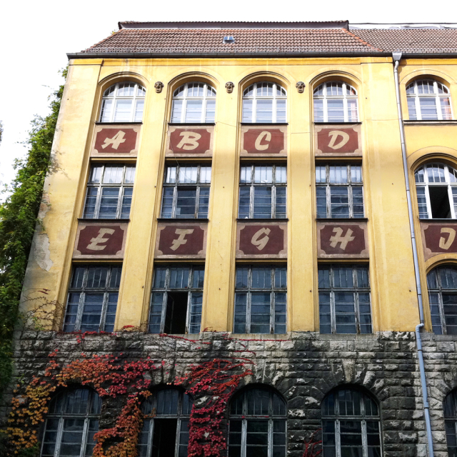 School with alphabet painted on facade